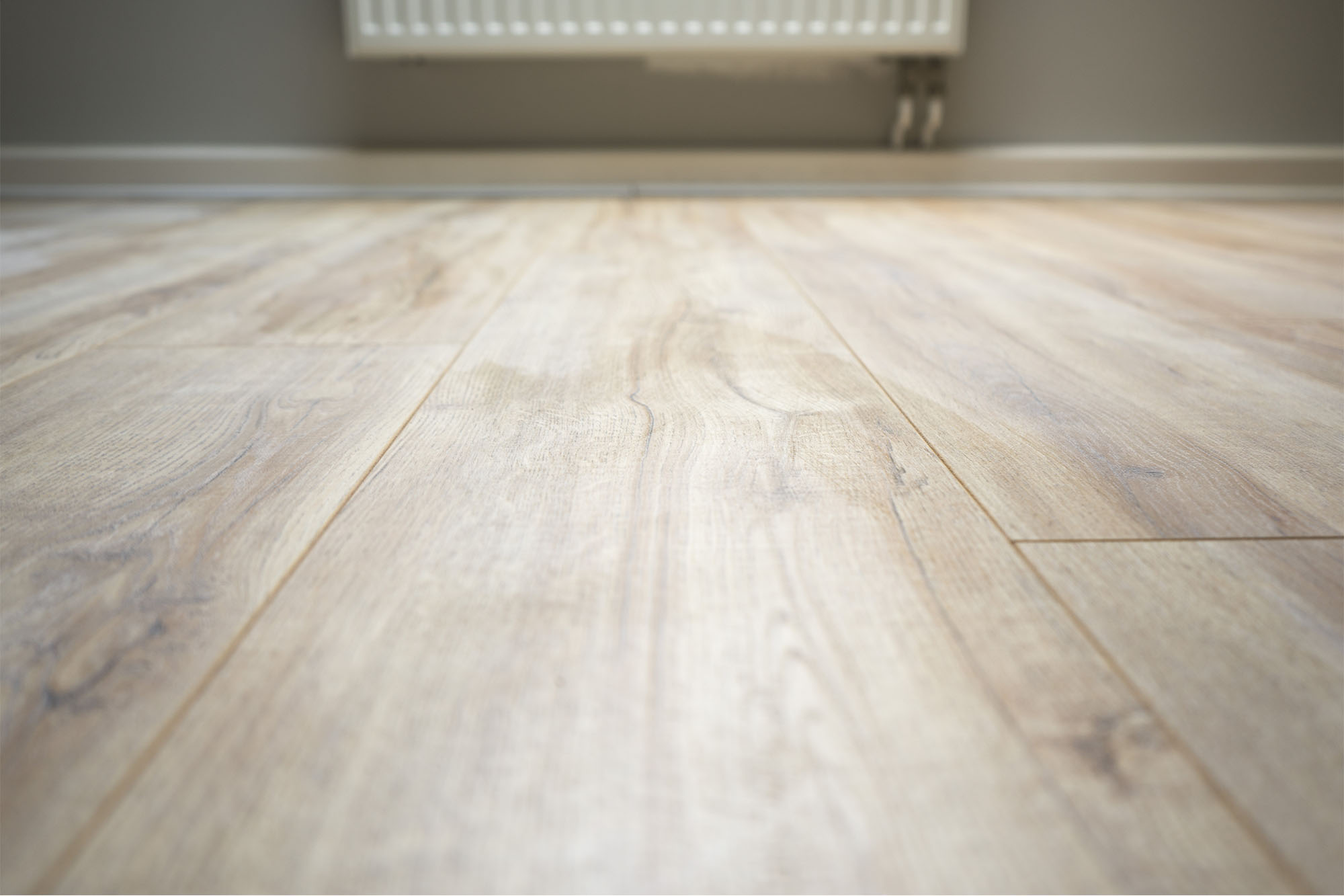 Our signature laminate floor “Home Bau”